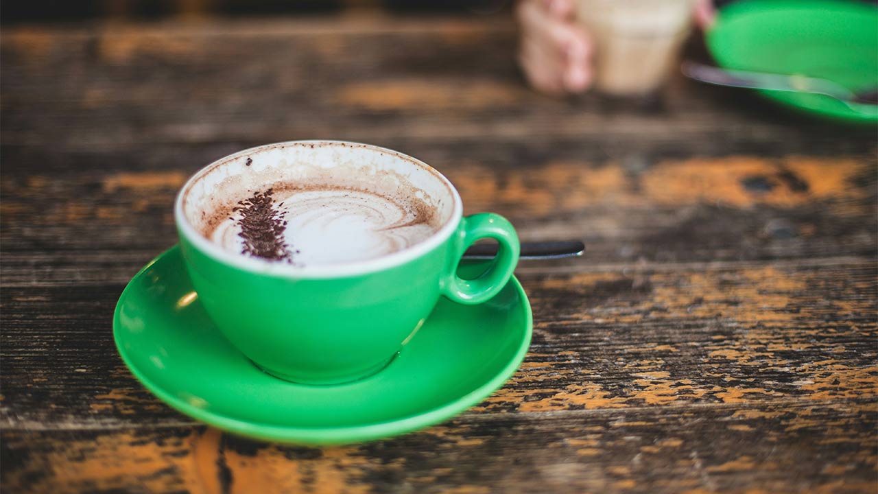 cappuccino in green mug