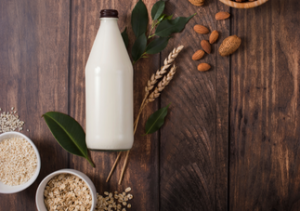 plant based milks bottle with oats and almonds