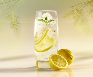 glass of sparkling water with lemon and mint