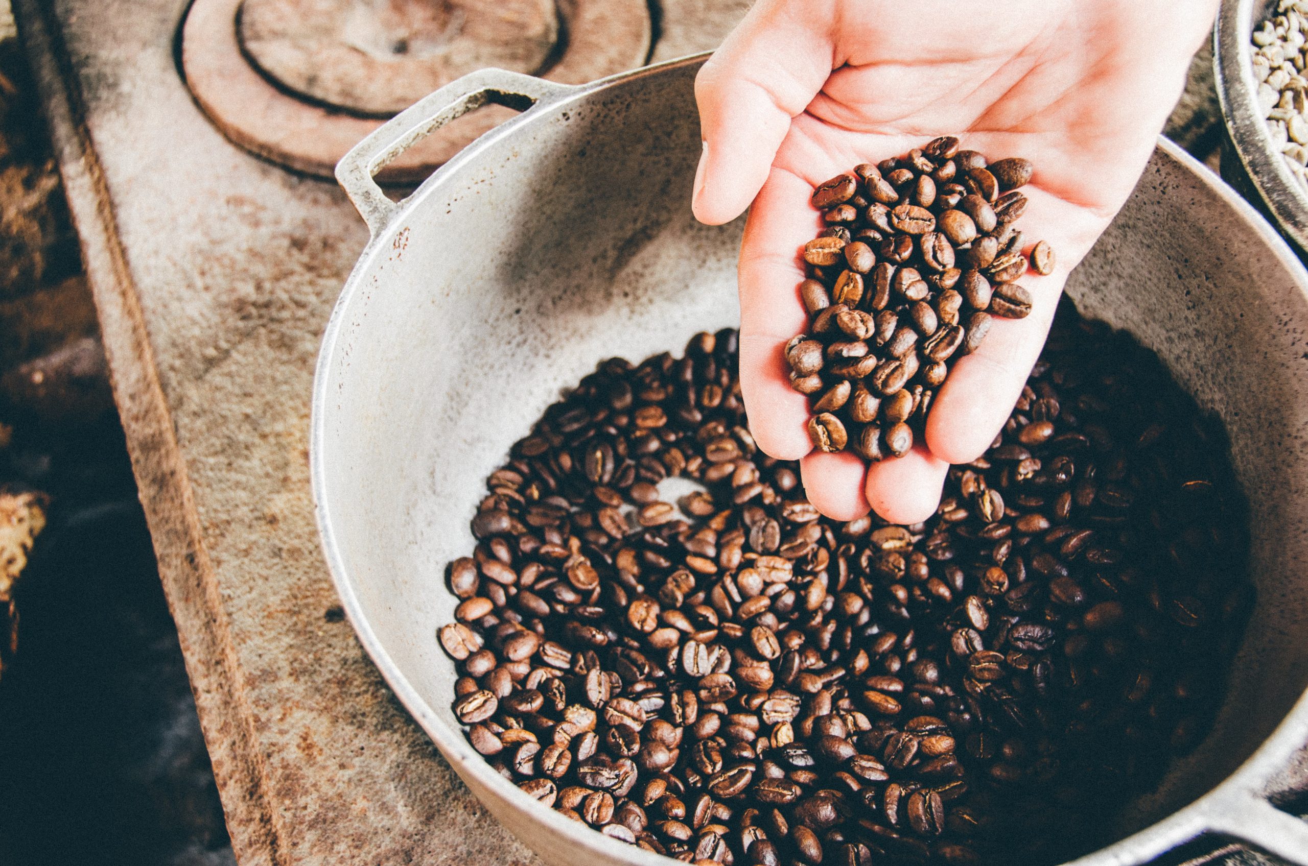 coffee beans in hand