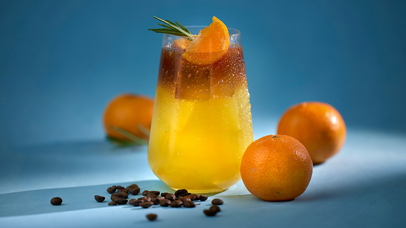 Orange coffee in a glass