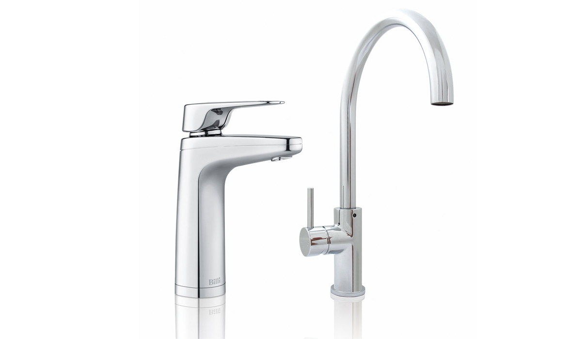 Quadra tap and mixer tap on plain background