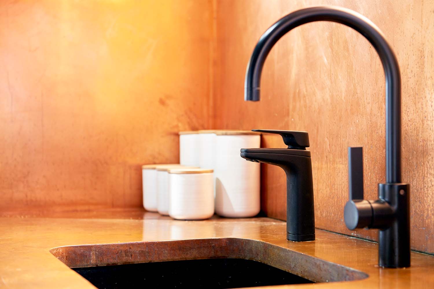 quadra plus tap system in place against an orange and brown countertop