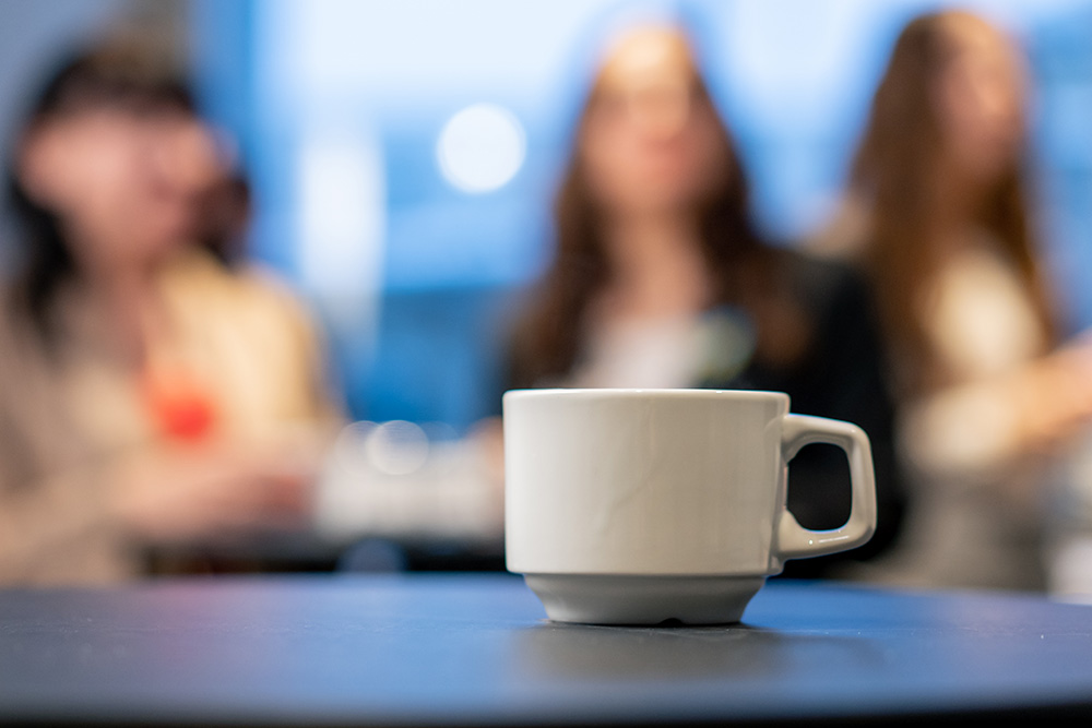 Close up cup of coffee on table
